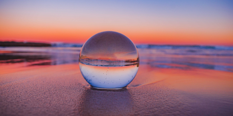 10 Business Benefits of B2B PR - crystal ball in sunset on beach